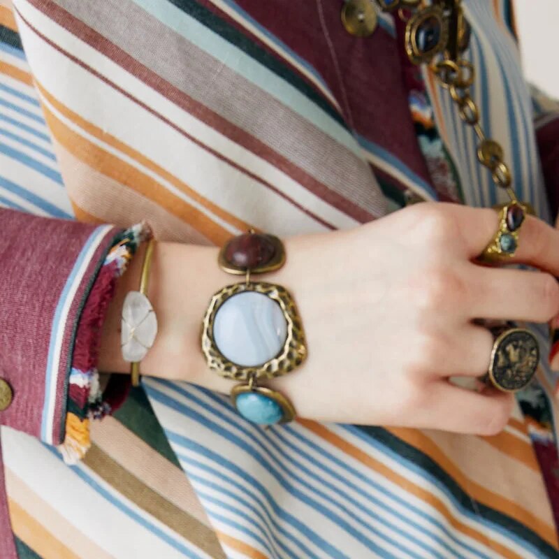 The Enchantment of Charms: Weaving Personal Narratives into Jewelry