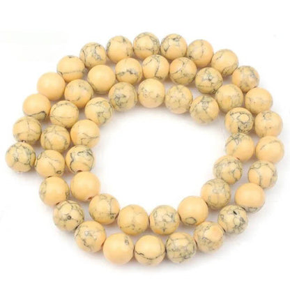 Gelbe Howlith-Rundperlen, 2–12 mm