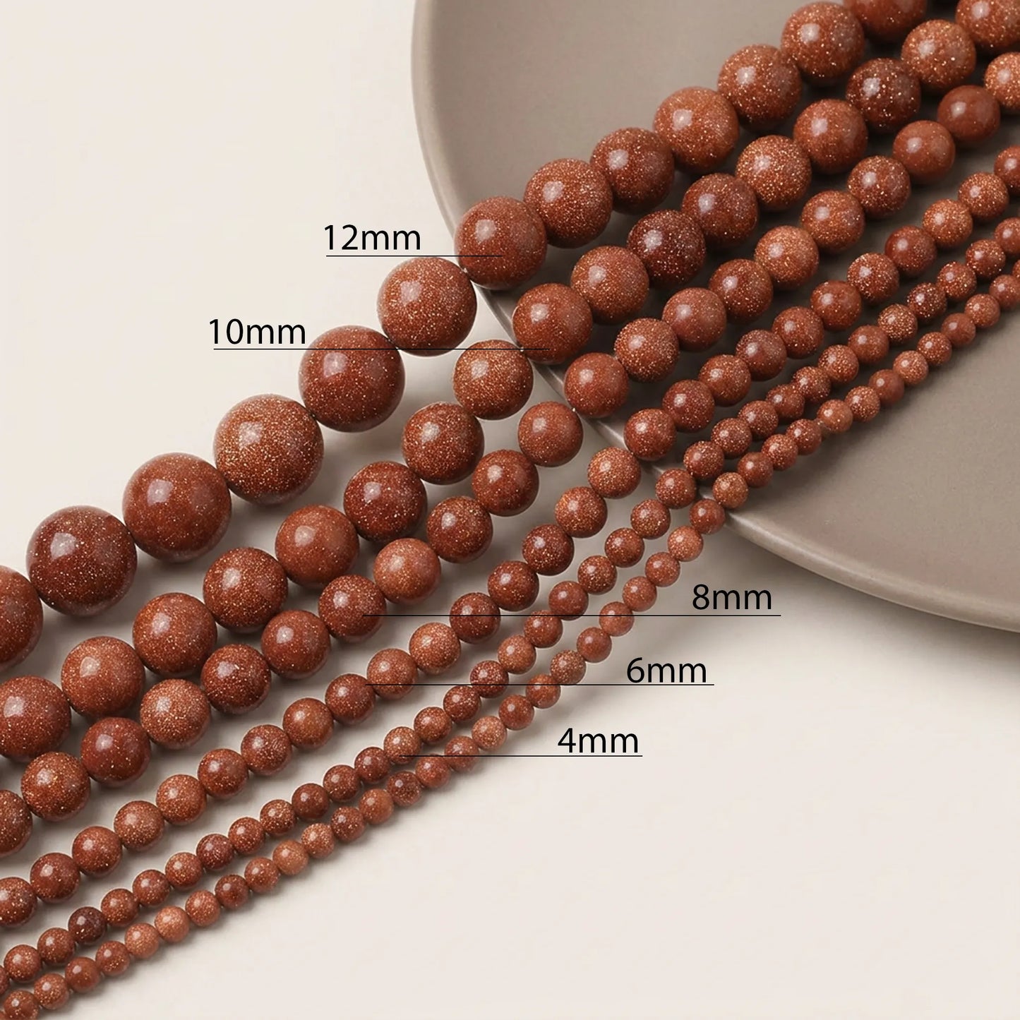 Gold sandstone beads available in multiple sizes