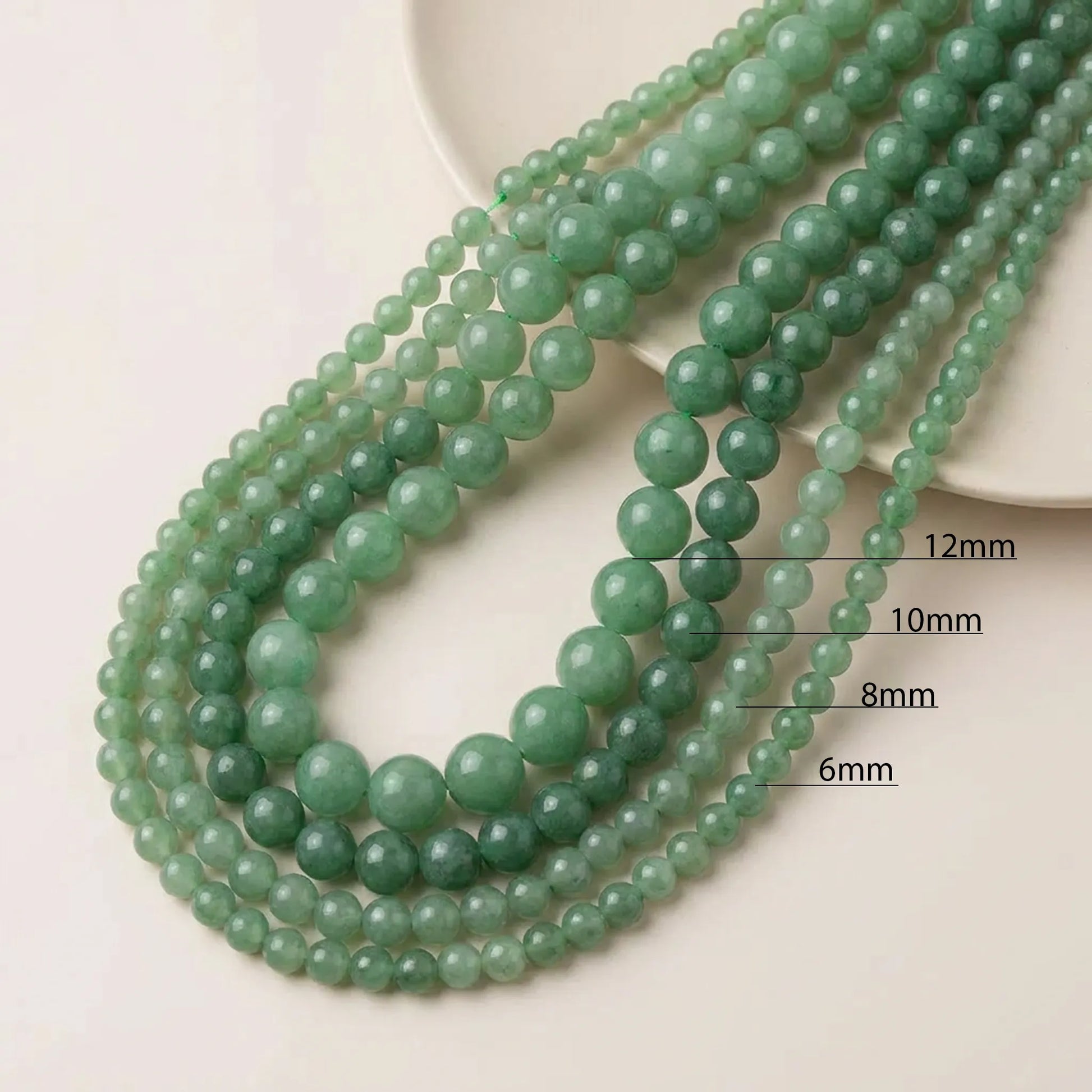Natural green aventurine beads available in multiple sizes