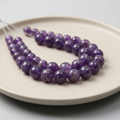 Round amethyst beads with smooth purple surface