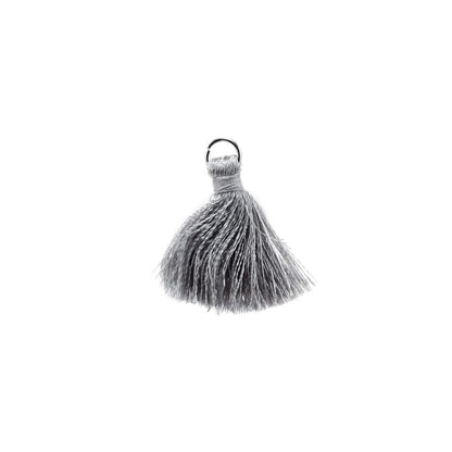 10 à 20 pendentifs à petits pompons en coton de 2 cm.