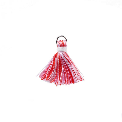 10 à 20 pendentifs à petits pompons en coton de 2 cm.