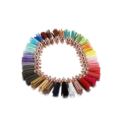 60 pendentifs en cuir vintage avec pampilles de 38 mm.