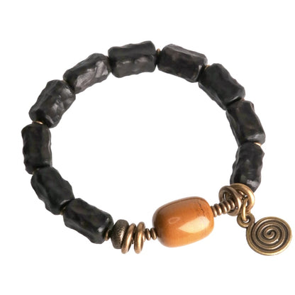 carved-ebony-wood-vintage-copper-bracelet.jpg