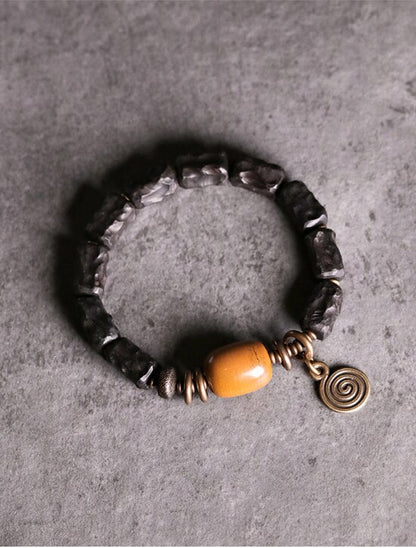 carved-ebony-wood-vintage-copper-bracelet.jpg