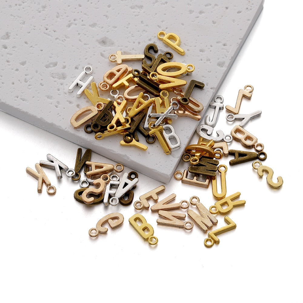 26 Stück 7 x 16 mm Legierung Alphabet AZ Buchstaben Charms Anhänger
