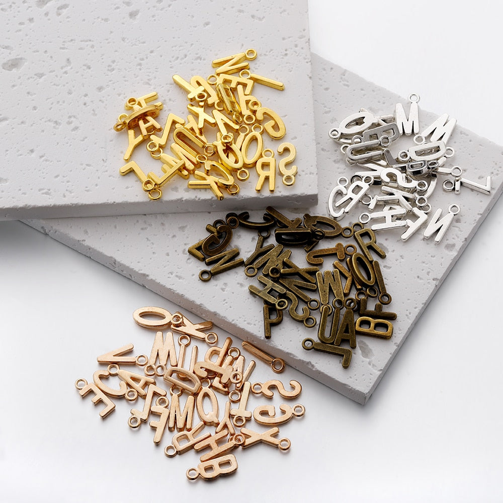 26 Stück 7 x 16 mm Legierung Alphabet AZ Buchstaben Charms Anhänger